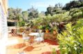 immobilier llanca: villa ref.2901, belle terrasse entourée de verdure